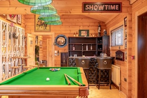 log cabin with pool table