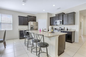 Kitchen Counter With bar stools