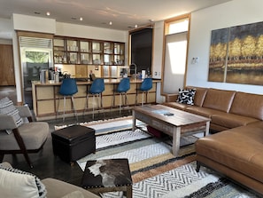 You'll be the perfect temperature with heated concrete floors underfoot and A/C heat pump above.