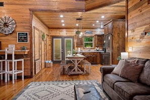 You'll love how the vaulted ceilings and big open spaces contribute to the beauty of this cabin.