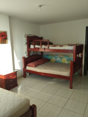 Bunk Bed (queen and single beds) and a floor mattress. 