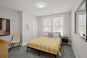 Relax and recharge in our inviting second bedroom, complete with a flat-screen Roku TV and a plush queen bed for a restful night's sleep.