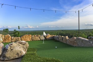 Putting Green: Tee off with breathtaking views in your private putting paradise!