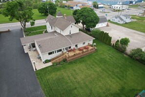 Oerhead drone shot overseeing back yard