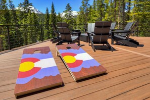 Custom cornhole game on deck, ready for summer!