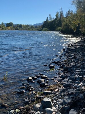 Walk to the river's edge for relaxation or fishing