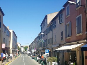 Sky, Window, Building, Infrastructure, Flowerpot, Plant, Road Surface, Urban Design, Thoroughfare, Residential Area