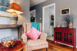 house 1 living room with tasteful antique decoration