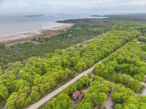 Enjoy the convenience of being close to the stunning shoreline, perfect for beach walks and water activities, with scenic views of the surrounding islands.