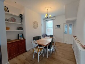 Dining area, open with the sitting room and leading to the galley kitchen