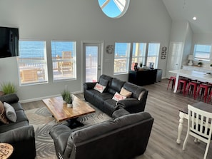 Comfy living room w plenty of seating and the best views