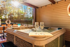 Adult time perfected! Hot tub under the stars, wine in hand, while kids dream upstairs. Because parents need vacations too. 
