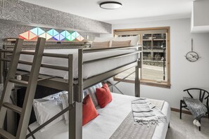 Queen over King adult bunk bed, so no guest has to compromise on sleep!