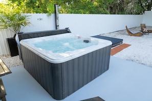 Make family and friend time more fun by spending it in this square hot tub spa.