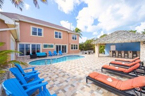 Entertaining is easy with the sea front patio and cabana style beach bar.