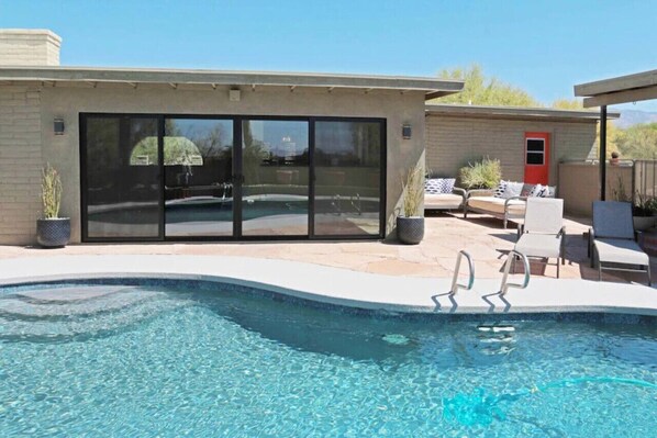 Backyard with beautiful pool (not heated) and plenty of outdoor seating
