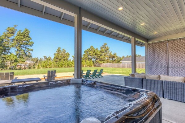 Relax in your private, covered hot tub! Soak, sip, and unwind—rain or shine. The perfect vacation rental for a romantic escape or a stress-free getaway!