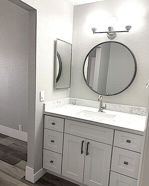 Primary bathroom attached to king suite.