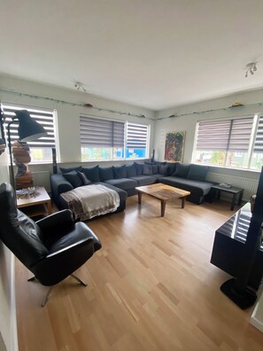 We have blackout blinds in all the rooms, including the living room and kitchen.