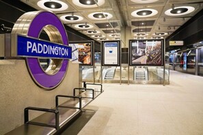 Paddington Station which is 5-8 minute walk from the apartment.