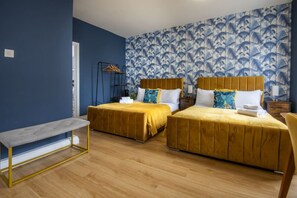 Room 1 has 2 queen-size bed and a sofa bed, it can fit up to 6 people.
