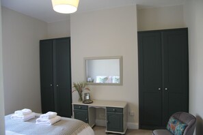 King bedroom with double wardrobes.