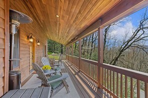 Covered Deck with Comfortable Seating to Enjoy the Mountain Air