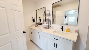 bathroom, off of Living Room, tub & shower combo. 