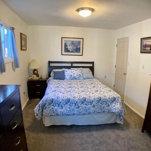 Master bedroom with queen bed