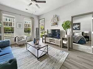 Decorative Living Room, 10' Ceilings, Walk out to the Patio with view of the Pool