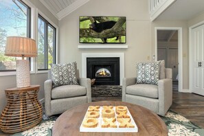 Plush Living Room with Tik-Tak-Toe, Cozy Fireplace, and Big Screen TV