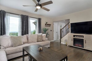 Main living room with 54" Smart TV.