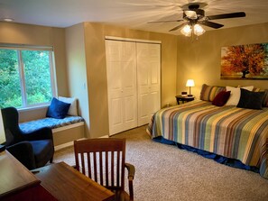 Nice window seat for curling up to read a good book.