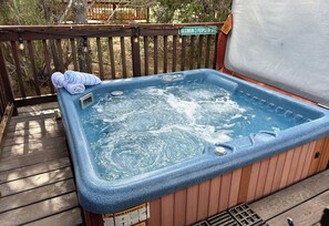 Soak in your private hot tub under the stars