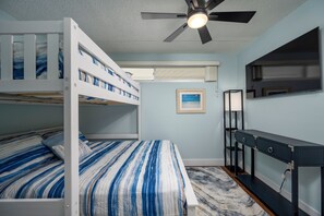 Top bunk is full size, bottom is queen