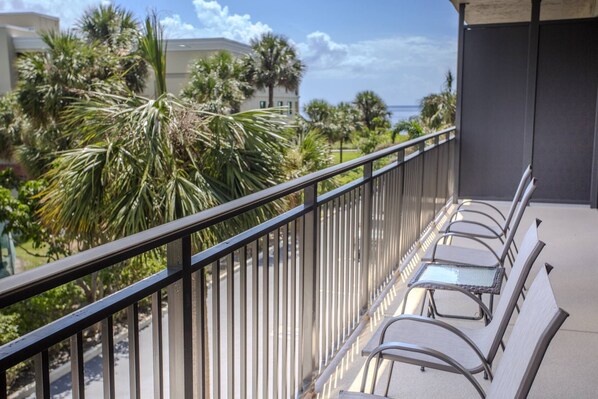 Large Balcony with Partial Beach View and Overlooking the Tennis Courts