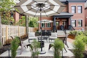 Enjoying BBQ-ing in your very own private garden oasis.
