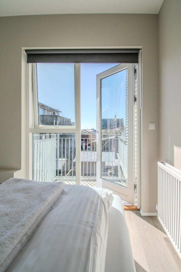 Bedroom With Balcony