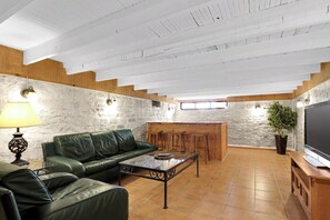 Charming bonus room featuring a bar