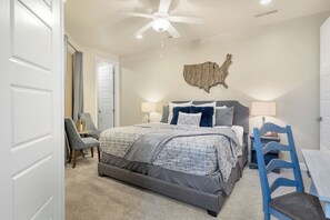 Main Bedroom - Come in and relax on our King bed located on the main floor.
