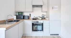 FULLY EQUIPPED KITCHEN FOR YOUR COOKING NEEDS