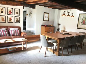 Dining table, chairs, sofa, coffee table and cabinet