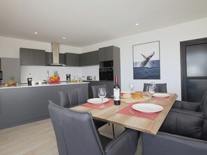 Open kitchen and dining area