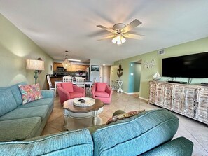 Comfortable living room furniture and large TV. Cotton Bayou 6A, 2 bedrooms 2 Bathrooms, Sleeps 6. Managed by Island Rentals