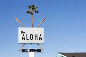 The Aloha Boutique Hotel, adorned with retro and tropical decor with a modern twist.