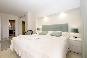 Master bedroom with a super king size bed and en-suite bathroom