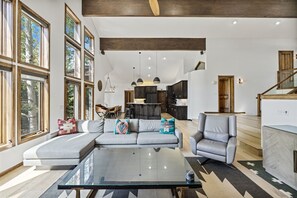 Large Living Area with Ample Seating and High Ceilings.
