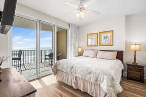 Gulf front master bedroom with a king size bed.