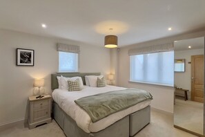 Sea Haven Cottage, Docking: Master bedroom with a 6' super-king size bed and bathroom