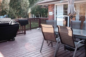 Enjoy a BBQ, a glass of wine, or morning coffee on the deck